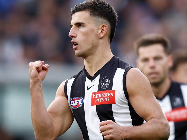 MELBOURNE, AUSTRALIA - JUNE 25: Nick Daicos of the Magpies celebrates a goal during the 2023 AFL Round 15 match between the Collingwood Magpies and the Adelaide Crows at the Melbourne Cricket Ground on June 25, 2023 in Melbourne, Australia. (Photo by Michael Willson/AFL Photos via Getty Images)