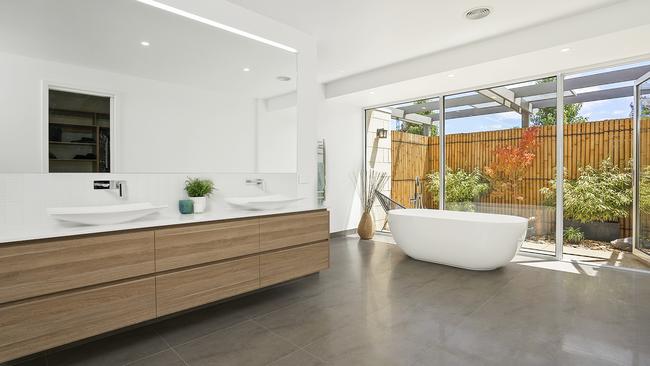 The ensuite links to a private Japanese inspired garden.