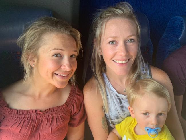 Christie Mantzouridis, Emily Taylor and her son Calvin Taylor were among passengers whose flight was diverted from Hobart to Launceston.