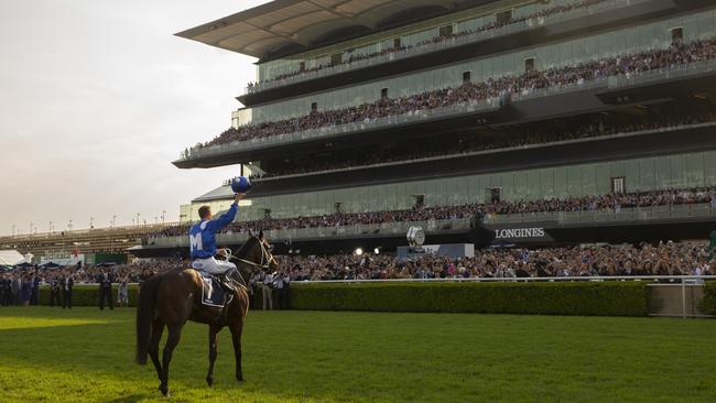 Jockey Hugh Bowman returns to the scale after riding Winx to victory in the Queen Elizabeth Stakes at the Royal Randwick. Picture: AAP