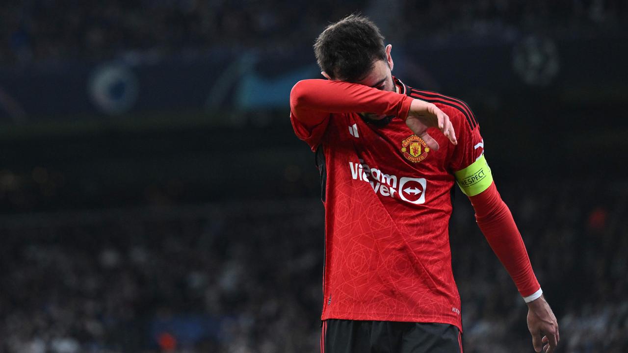 Manchester United's Portuguese midfielder #08 Bruno Fernandes reacts after the UEFA Champions League Group A football match between FC Copenhagen and Manchester United FC in Copenhagen, Denmark on November 8, 2023. (Photo by Jonathan NACKSTRAND / AFP)