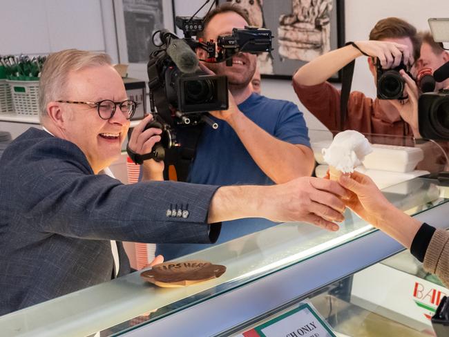 SYDNEY, AUSTRALIA - NewsWire Photos - Sunday, 4 May 2025:Prime Minister Anthony Albanese pictured serving Ice cream at Bar Italia, Norton Street, Leichhardt after having coffee with supporters.Picture: NewsWire / Monique Harmer
