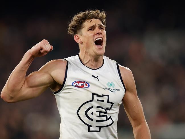 MELBOURNE, AUSTRALIA - AUGUST 13: Charlie Curnow of the Blues celebrates a goal during the 2022 AFL Round 22 match between the Melbourne Demons and the Carlton Blues at the Melbourne Cricket Ground on August 13, 2022 in Melbourne, Australia. (Photo by Michael Willson/AFL Photos via Getty Images)