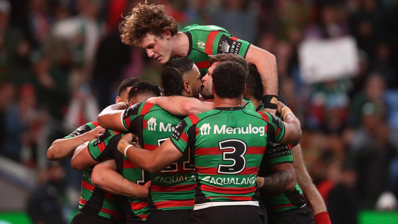 SYDNEY, AUSTRALIA - SEPTEMBER 17: Cameron Murray of the Rabbitohs celebrates a try with team mates during the NRL Semi Final match between the Cronulla Sharks and the South Sydney Rabbitohs at Allianz Stadium on September 17, 2022 in Sydney, Australia. (Photo by Jason McCawley/Getty Images)