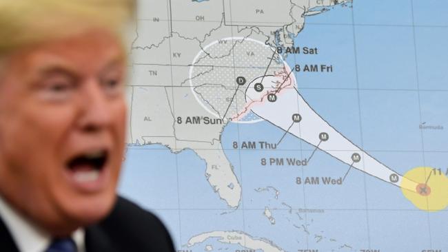 President Donald Trump talks about Hurricane Florence during a briefing in the Oval Office. Picture: Susan Walsh/AP