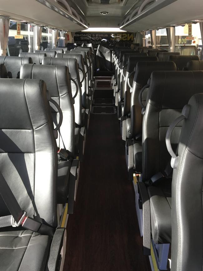 The reclining leather seats on the coach.