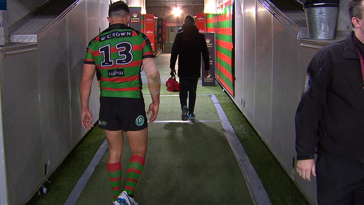 Sam Burgess gingerly walks up the tunnel after succumbing to a suspected hamstring strain.