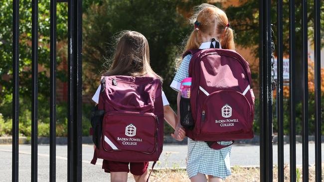 2018 Baden Powell College Prep students Matilda, 5 and Ariana, 5 at the college gates in Hoppers Crossing. Picture: Ian Currie