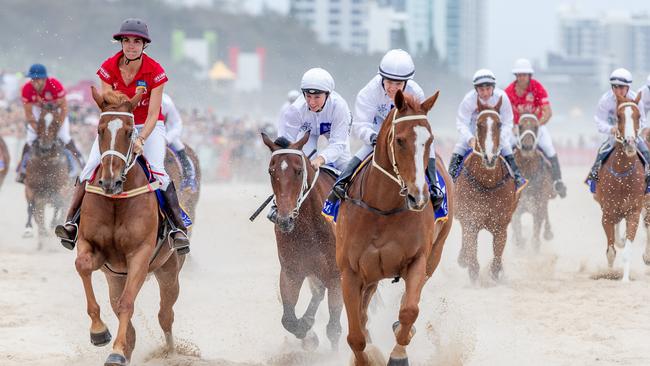 The famous beach reace at the Magic Millions Barrier Draw. Picture: Luke Marsden.