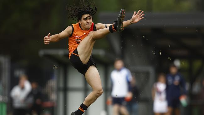 Isaac Kako of the Cannons kicks for goal. Photo by Daniel Pockett/AFL Photos/via Getty Images