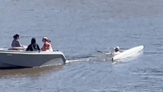 The rower is then swept down river while clinging on to the vessel. Picture: Tik Tok / Paul Dowsley