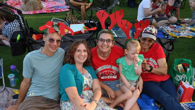 Carols by Candlelight at Riverway 2022. Tony and Revbecca Gordon with Cass Byatt and Kay Eames with Mackenzie, 3. Picture: Evan Morgan