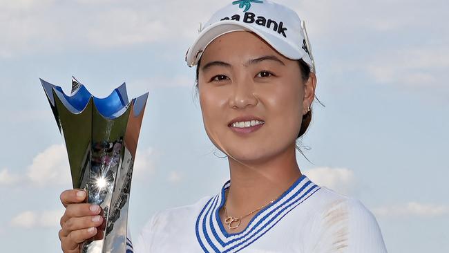 CINCINNATI, OHIO - SEPTEMBER 10: (EDITOR'S NOTE: This image was sent with alternate crop). Minjee Lee of Australia celebrates with the trophy after winning in a two-hole playoff against Charley Hull (not pictured) of England during the final round of the Kroger Queen City Championship presented by P&amp;G at Kenwood Country Club on September 10, 2023 in Cincinnati, Ohio. Dylan Buell/Getty Images/AFP (Photo by Dylan Buell / GETTY IMAGES NORTH AMERICA / Getty Images via AFP)