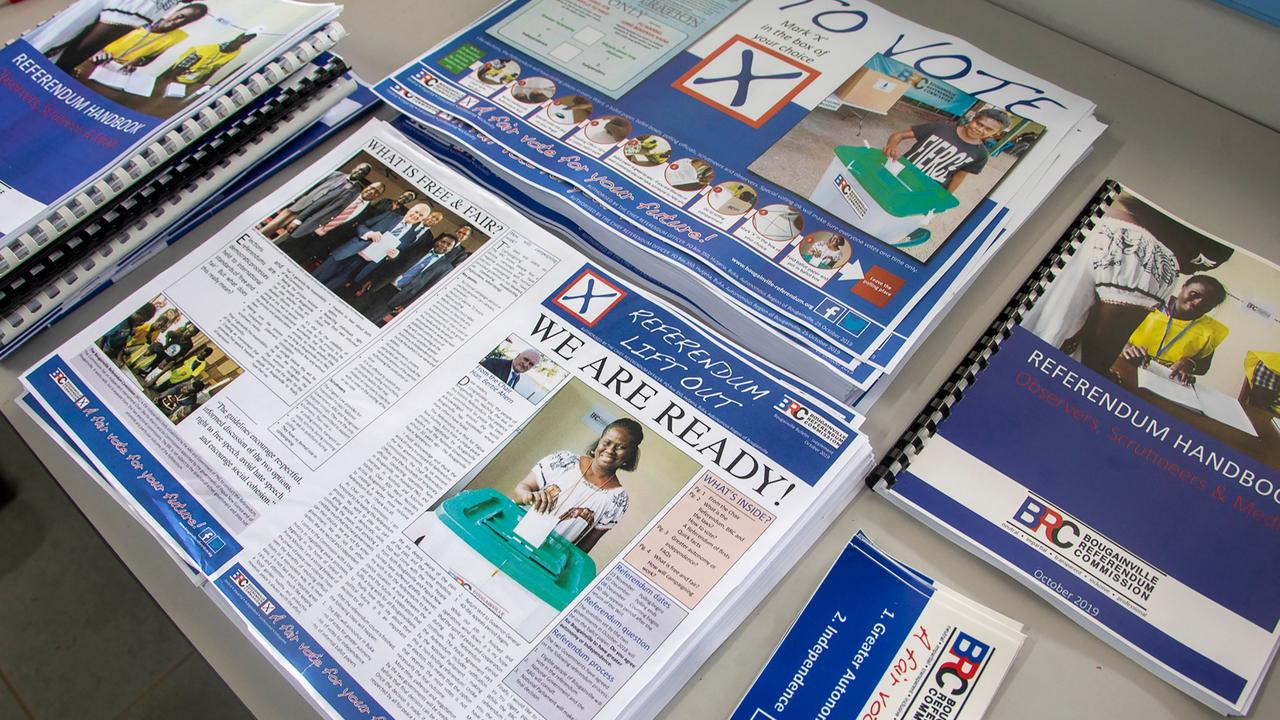 Voting information pamphlets at a polling station ahead of the independence vote. Picture: Ness Kerton/AFPSource:AFP