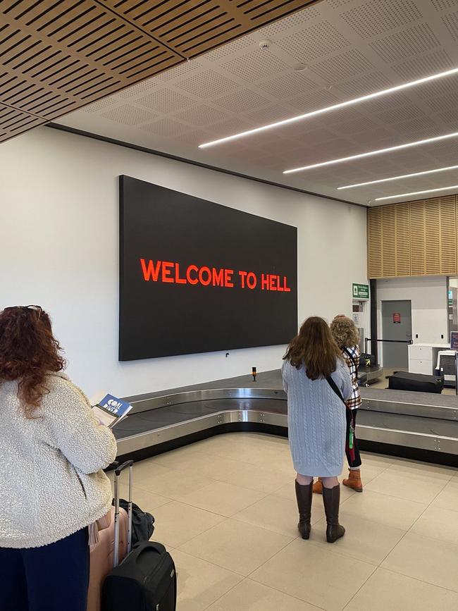 Dark Mofo’s 'Welcome to Hell' sign at Hobart Airport, which was taken down after one day, Picture: Twitter/Matilda Boseley