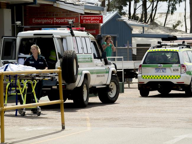 The scene outside the Esperance District Hospital showing the 4WD ambulance that transferred the shark attack victim.