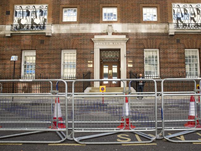 Security barriers are erected for the press outside the Lindo Wing of St Mary's hospital in central London on April 17, 2015, where the Duchess of Cambridge is expected to give birth later this month.