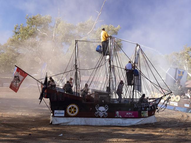 ALICE SPRINGS, AUSTRALIA - AUGUST 17: Imparja Battle of the Boats during the Henley-On-Todd Regatta on August 17, 2019 in Alice Springs, Australia. The annual "boat" race is held in the sandy bed of the Todd River in Alice Springs. It is the only dry river boating Regatta in the world where participants race homemade boats in a variety of races to raise money for charity. The nearest large body of water from Alice Springs is approximately 1,500 kilometres away. (Photo by Wendell Teodoro/Getty Images)