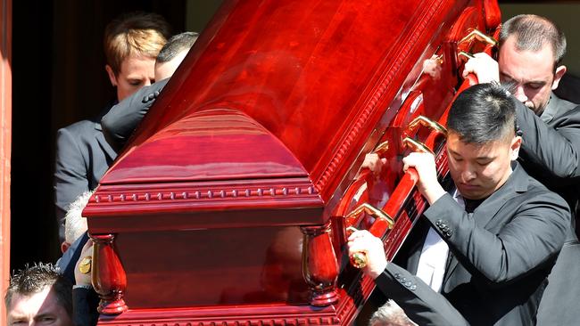 Karen's coffin is carried from St Johns Uniting Church, Essendon. Picture: Nicole Garmston