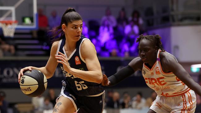 GEELONG, AUSTRALIA - OCTOBER 30: Daniel Raber of Geelong United dribbles the ball against Nya Lok of the Townsville Fire during the round one WNBL match between Geelong United and Townsville Fire at The Geelong Arena, on October 30, 2024, in Geelong, Australia. (Photo by Kelly Defina/Getty Images)