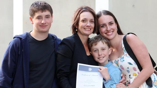 Susie Forte with her children Brodie, 16, Sam, 10, and Emma, 23, following her admission ceremony to be a practising lawyer, Supreme Court of Queensland, Brisbane. Picture: Liam Kidston.