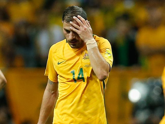 SAITAMA, JAPAN - AUGUST 31:  Australia players show dejection after Japan's first goal during the FIFA World Cup Qualifier match between Japan and Australia at Saitama Stadium on August 31, 2017 in Saitama, Japan.  (Photo by Kiyoshi Ota/Getty Images)