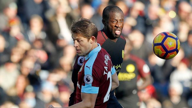 Toure (R).