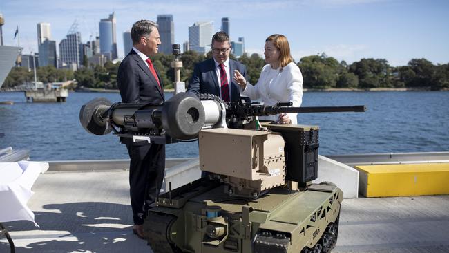 Mr Marles with Defence Industry Minister Pat Conroy and Chief Defence Scientist Tanya Monro.