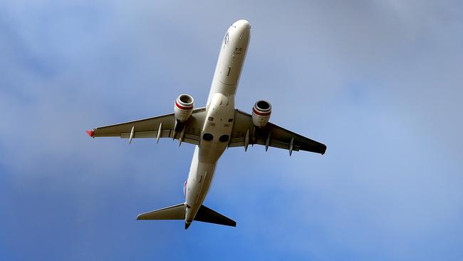 A Virgin plane takes off from Hobart Airport.