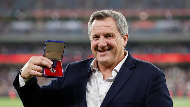 Brian Wilsonh his now found Brownlow Medal. Picture: Getty Images