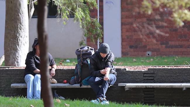 A man appears to shoot up at the housing estate. Picture: Alex Coppel.