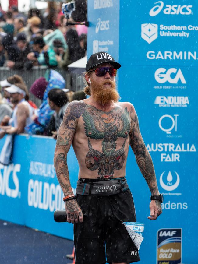 Gold Coaster Jake Malby finishes the 2019 Gold Coast Marathon. He will run 31 marathons in 31 days in August.