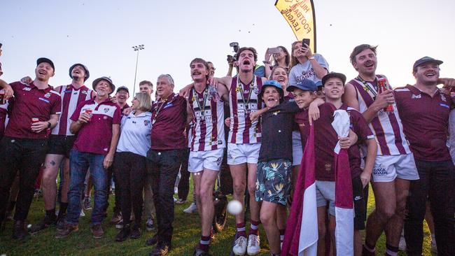 Nairne Bremer sings the song after its HFL div one flag. Picture: Nairne Bremer Football Club