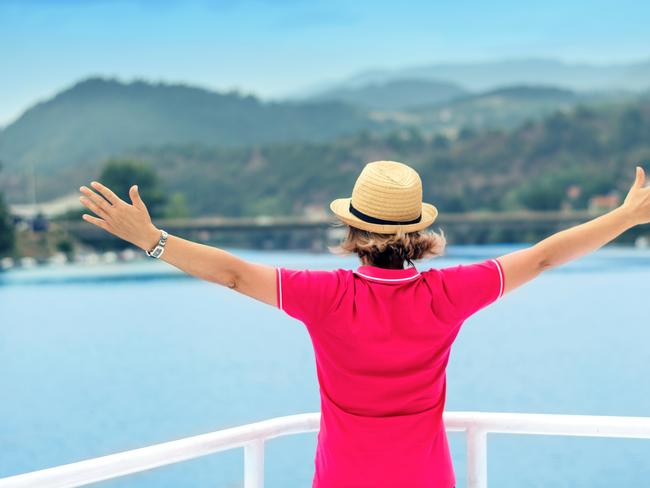 Woman enjoying her vacation on sailboat