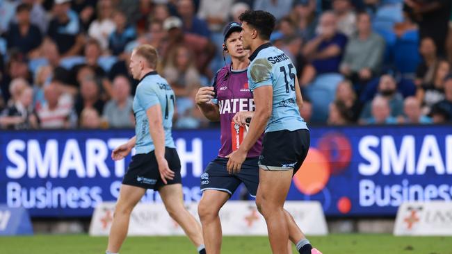 SYDNEY, AUSTRALIA - FEBRUARY 14: Joseph-Aukuso Suaalii of the Waratahs limps after a heavy tackle during the round one Super Rugby Pacific match between NSW Waratahs and Highlanders at Allianz Stadium, on February 14, 2025, in Sydney, Australia. (Photo by Darrian Traynor/Getty Images)