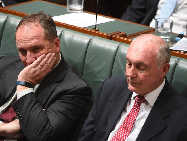 Federal Minister for Agriculture Barnaby Joyce and Federal Minister for Infrastructure and Deputy Prime Minister Warren Truss during Question Time. Picture: AAP