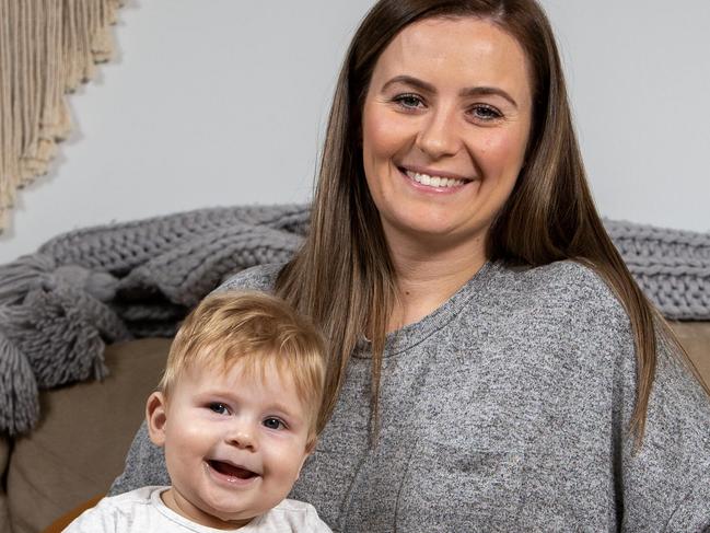 ADELAIDE, AUSTRALIA - NewsWire Photos MARCH 20, 2023: Krystal Mackintosh with her second child Angus 8 mths old at home in Morphett Vale, SA. Picture: NCA NewsWire / Emma Brasier