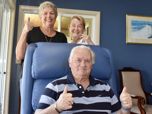 West Ballina residents John Chaseling (front), Anne Lodington (left ) and Marilyn Chaseling (right) celebrate the court's decision to oppose the proposed 300-home development by GemLife.