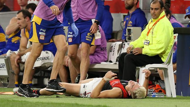 Matt Guelfi after colliding with the Perth Stadium fence. Picture: Getty