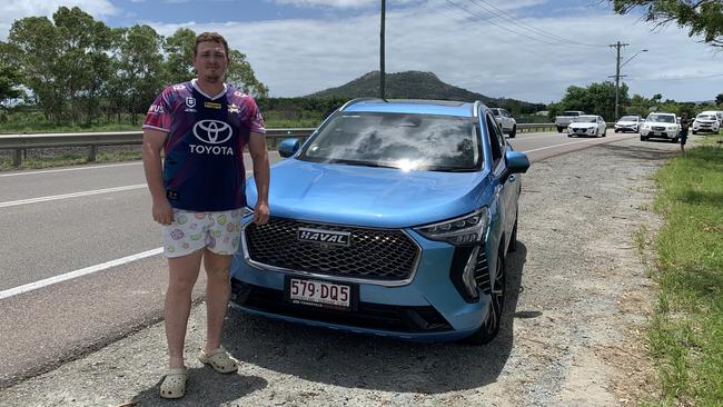 Kirwan resident Rhys Bell in front of his partner’s car which was stolen in the early hours of Friday morning before being located by police.