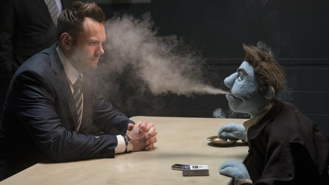 This image released by STX Entertainment shows Joel McHale in a scene from "The Happytime Murders." (Hopper Stone/STX Entertainment via AP)