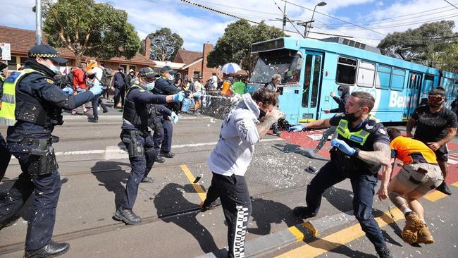 Police used capsicum spray to subdue protesters. Picture: Jason Edwards