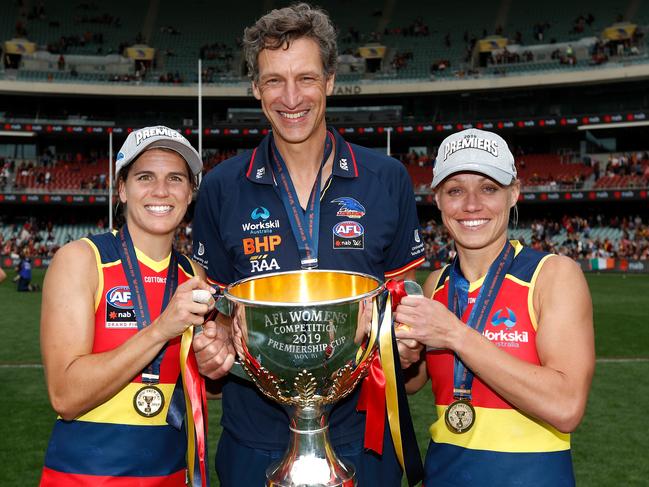 Crows coach Matthew Clarke pictured with the premiership cup after last year’s AFLW grand final with co-captains Chelsea Randall and Erin Phillips. Picture: Michael Willson/AFL Photos