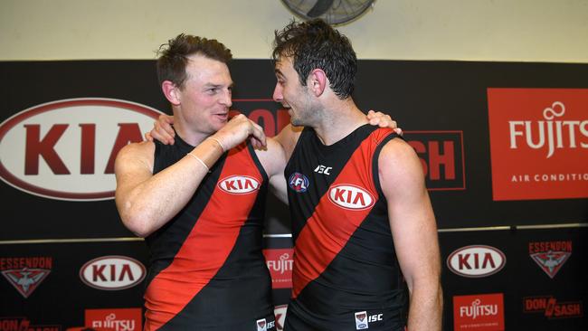 Jobe Watson and Brendon Goddard share a moment in the Essendon rooms after a win. Picture: AAP Images