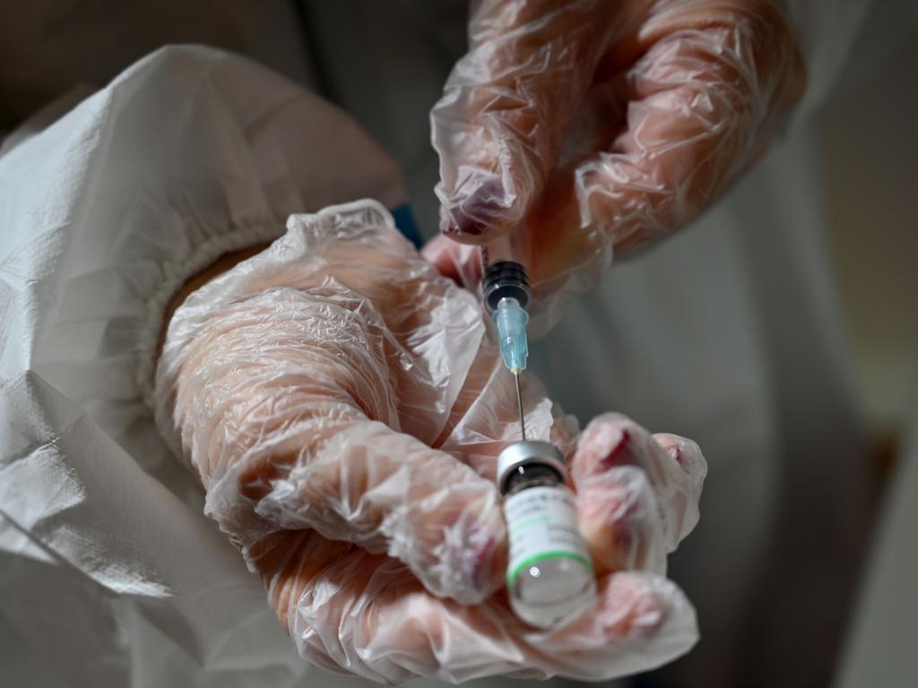 Travellers entering Australia who are aged between 18 and 60 and have been vaccinated with Sinopharm will be recognised as fully vaccinated by ATAGI. Picture: Andrej ISAKOVIC / AFP