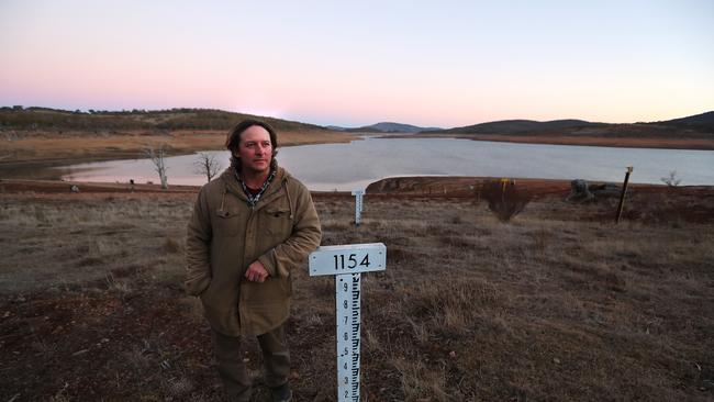 Andrew Basford, son of Alan, at the greatly depleted Lake Eucumbene. Picture: Kym Smith