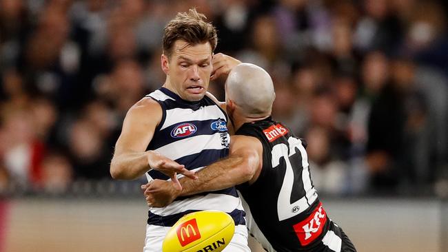 Steele Sidebottom hits Shaun Higgins with a big tackle in round 3. Picture: Dylan Burns/AFL Photos via Getty Images