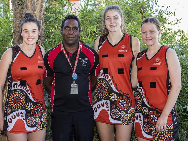 Dana Schembri, Gabby Coffey and Sophie Gaynor with Curtis Haines after being picked to play for the Territory. Picture: Christine Ansorge