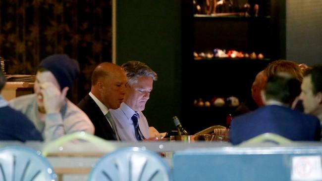 Peter Dutton and Mathias Cormann having dinner at Portia's Place restaurant in Kingston last night. Picture: Jonathan Ng