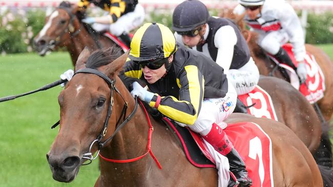 Craig Williams wins the Tour Edge Handicap aboard Fickle at The Valley. Picture: Scott Barbour / Racing Photos